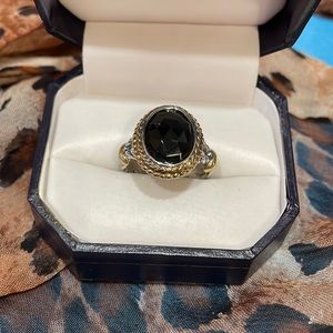 Sterling ring two tone with black stone.